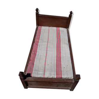 Ancient doll bed