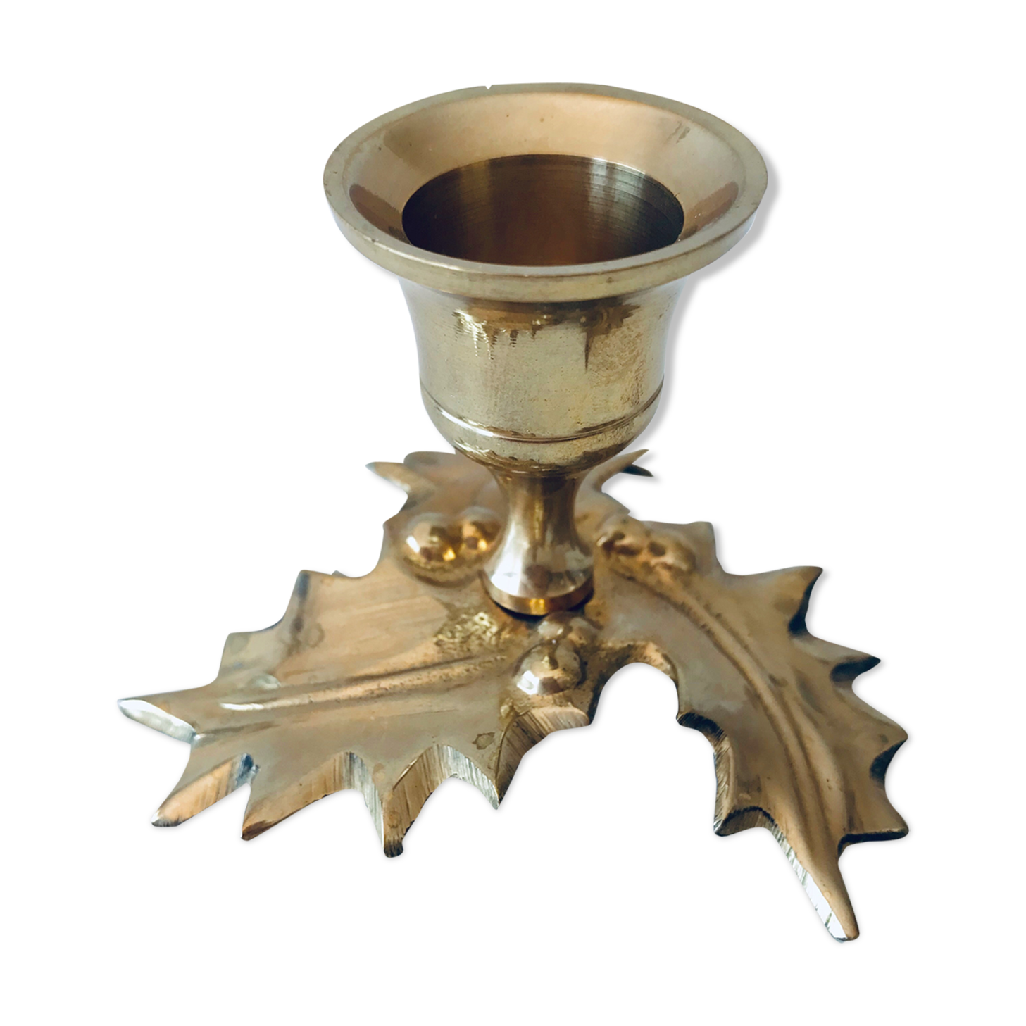 Candlestick in brass holly design