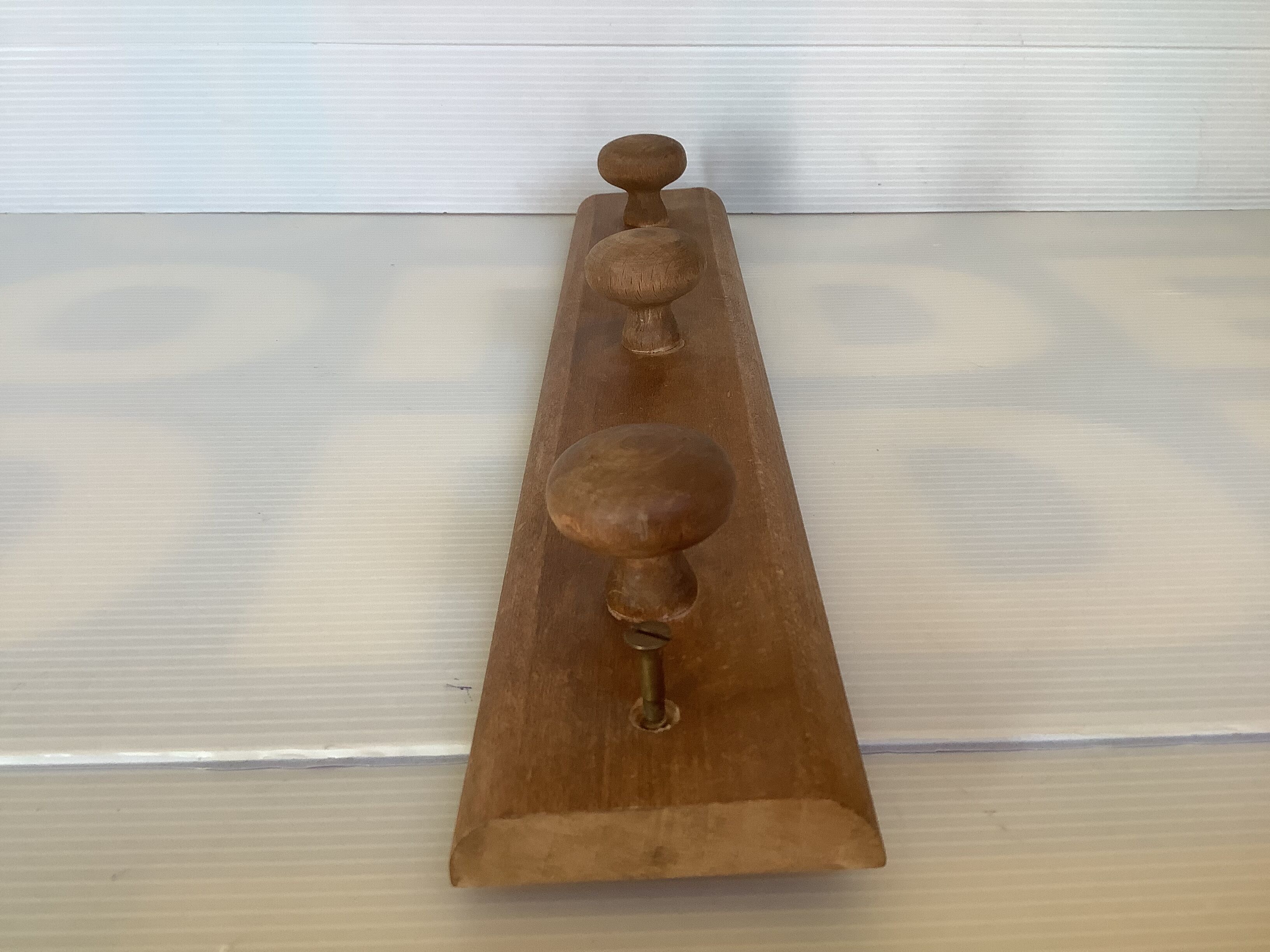 Wooden wall coat rack