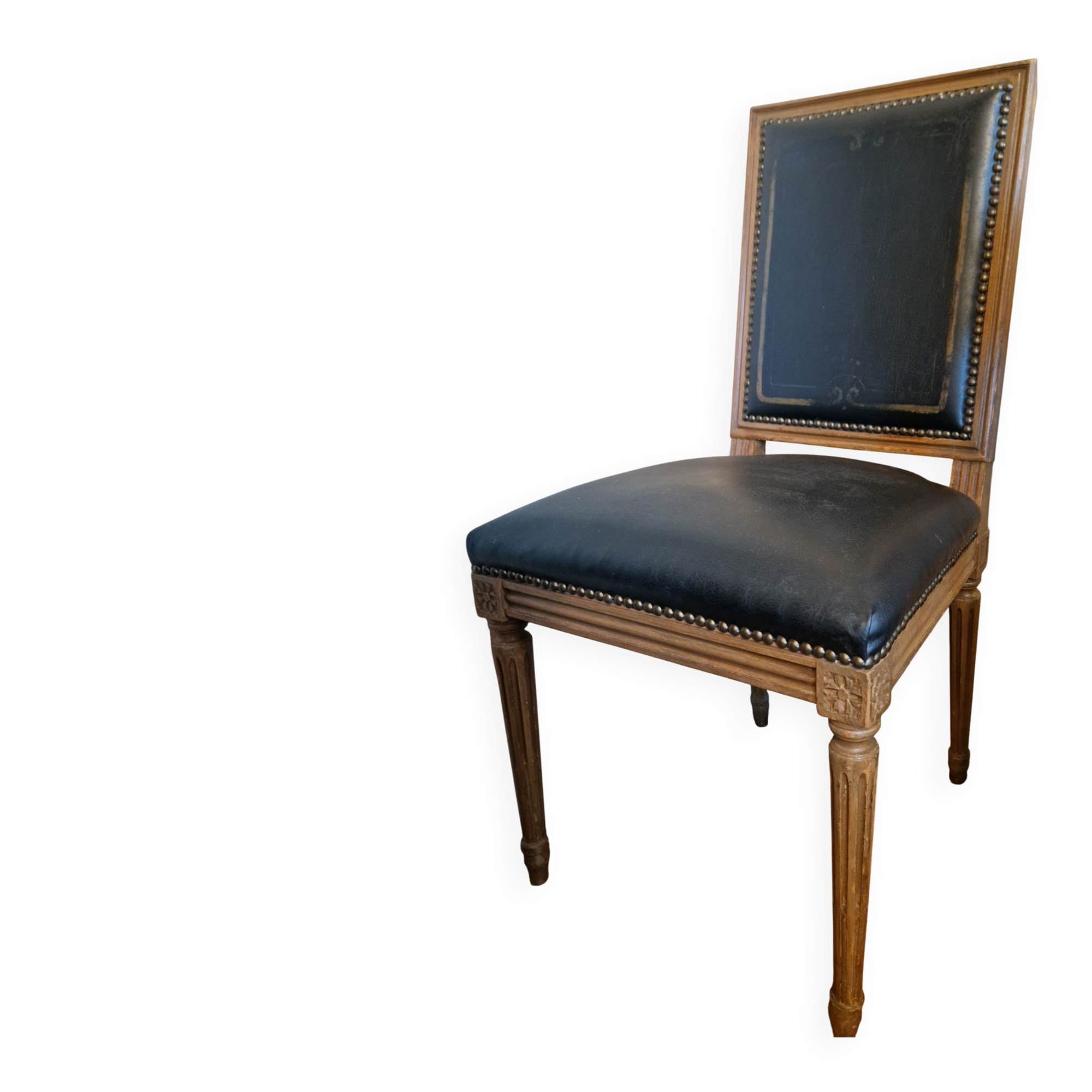 Antique Louis XVI style chair in solid wood and patinated leather.