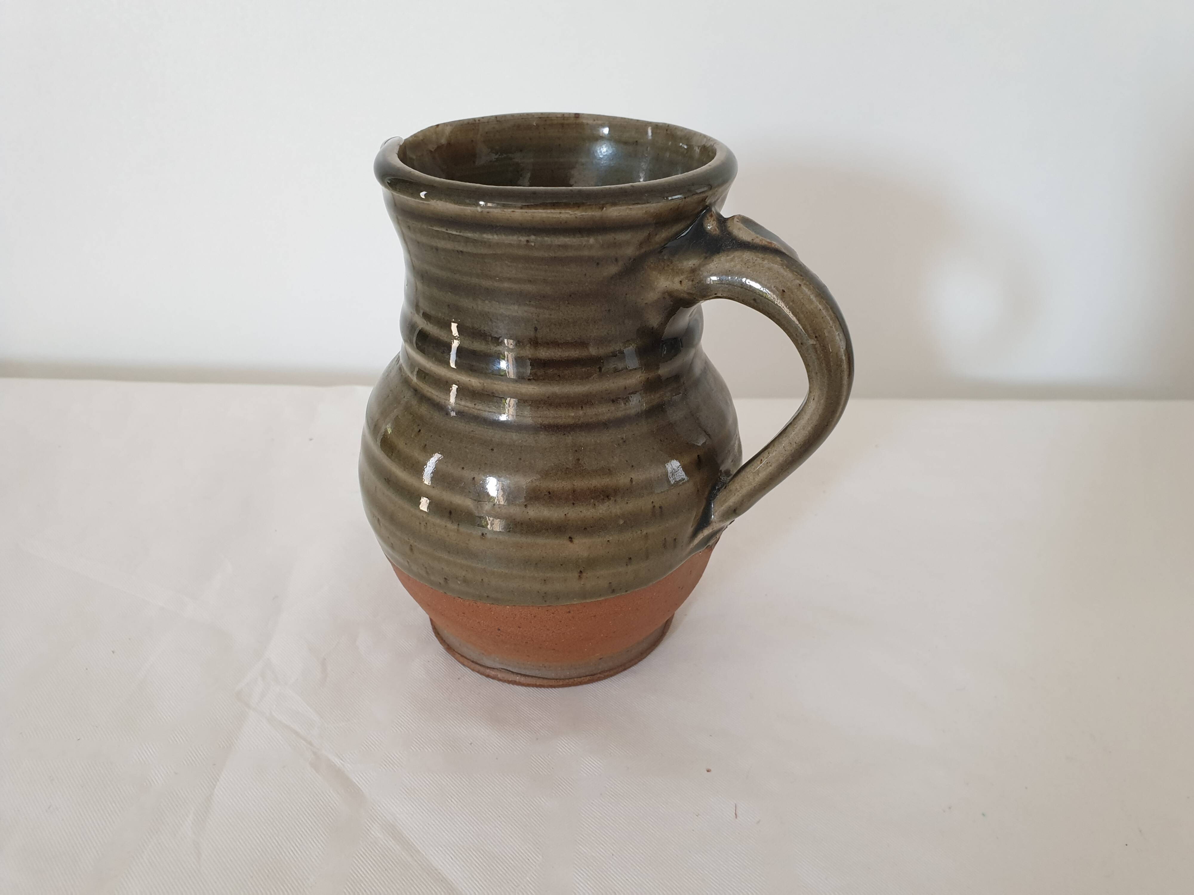 Small pitcher in glazed ceramic signed JC Seguin Puisaye (pictogram)