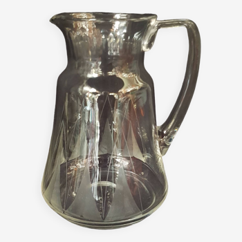 Chiseled glass pitcher