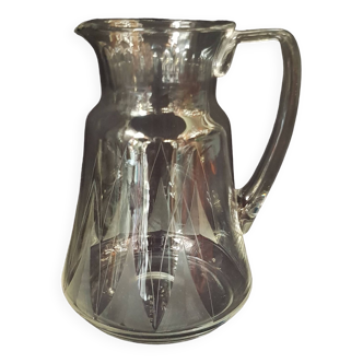 Chiseled glass pitcher