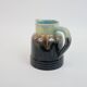 Art Deco pitcher in black, brown and blue glazed ceramic