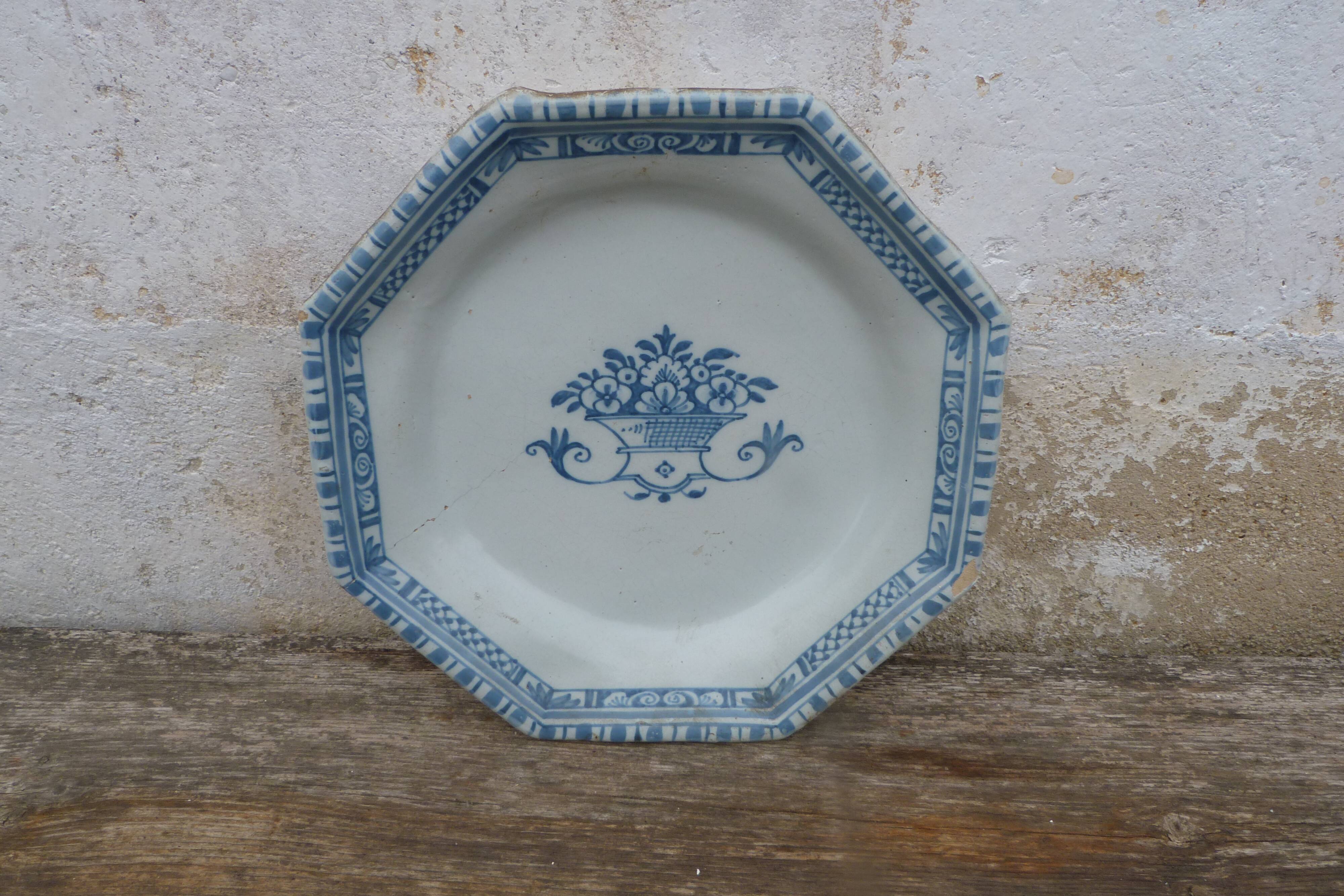 Large octagonal antique plate in Rouen faience.