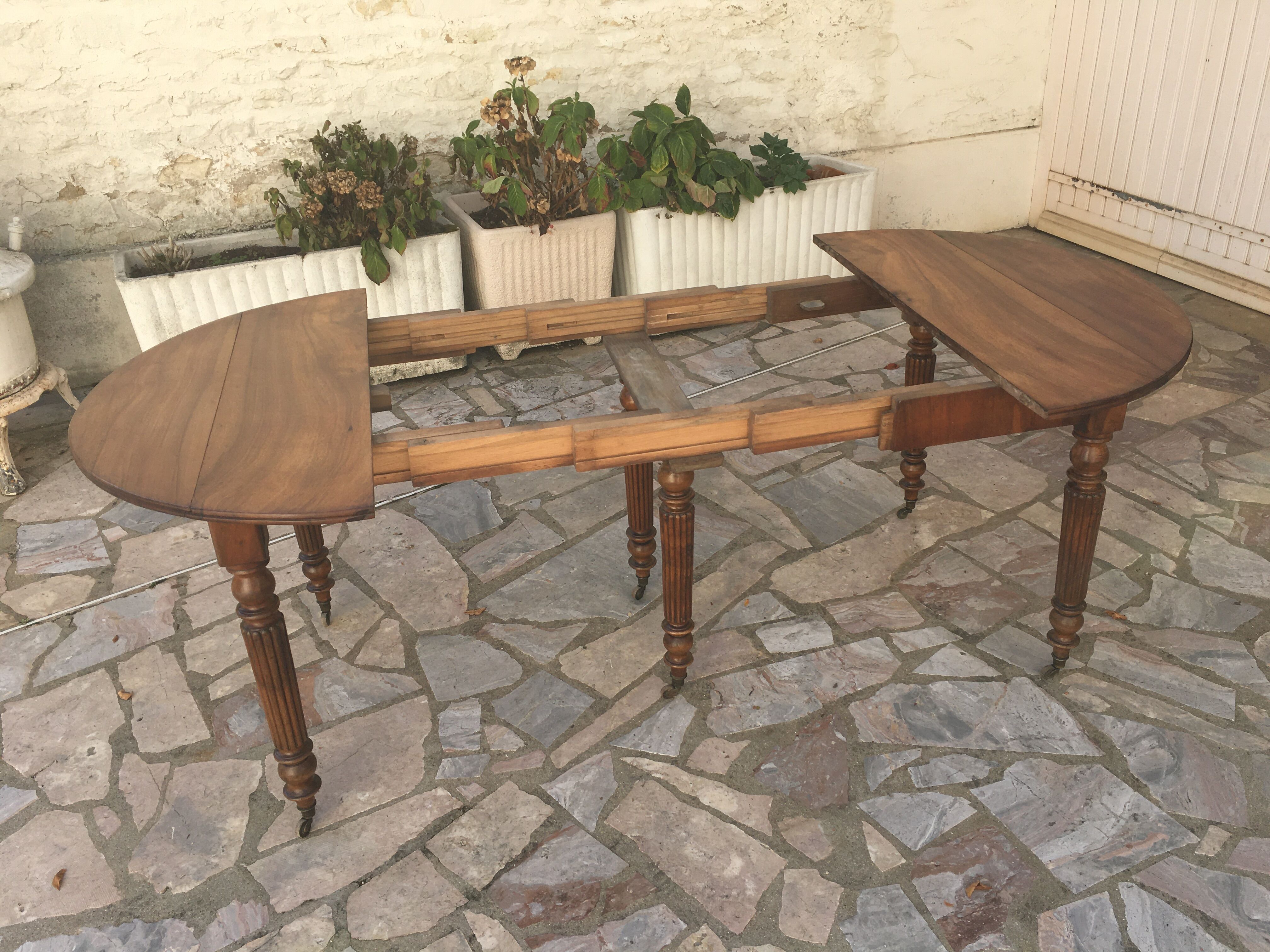 Round table 6 feet 3 solid walnut extensions