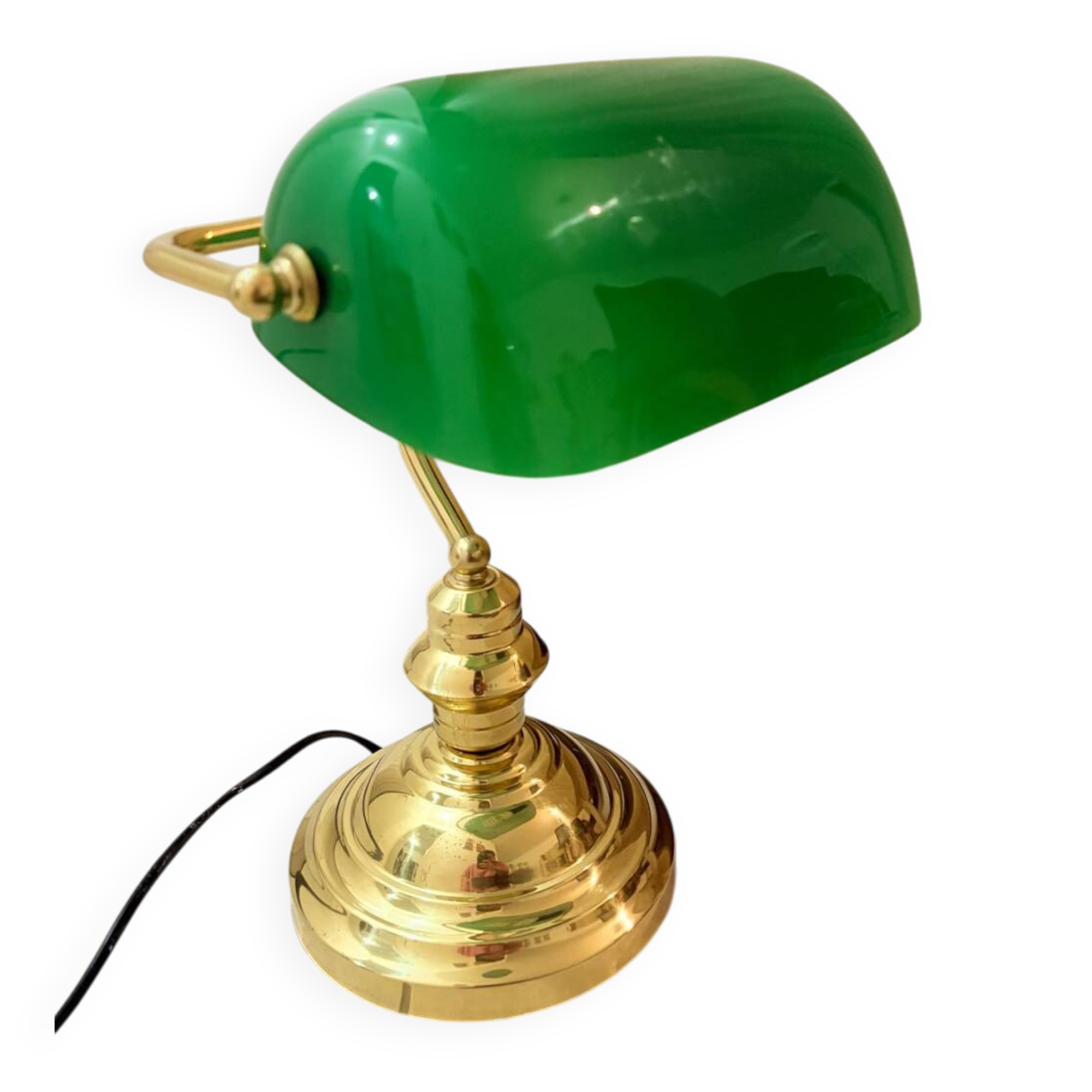 Gold and green banker’s desk lamp.