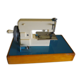 Electric motor for year 1950 child sewing machine