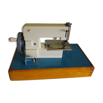 Electric motor for year 1950 child sewing machine