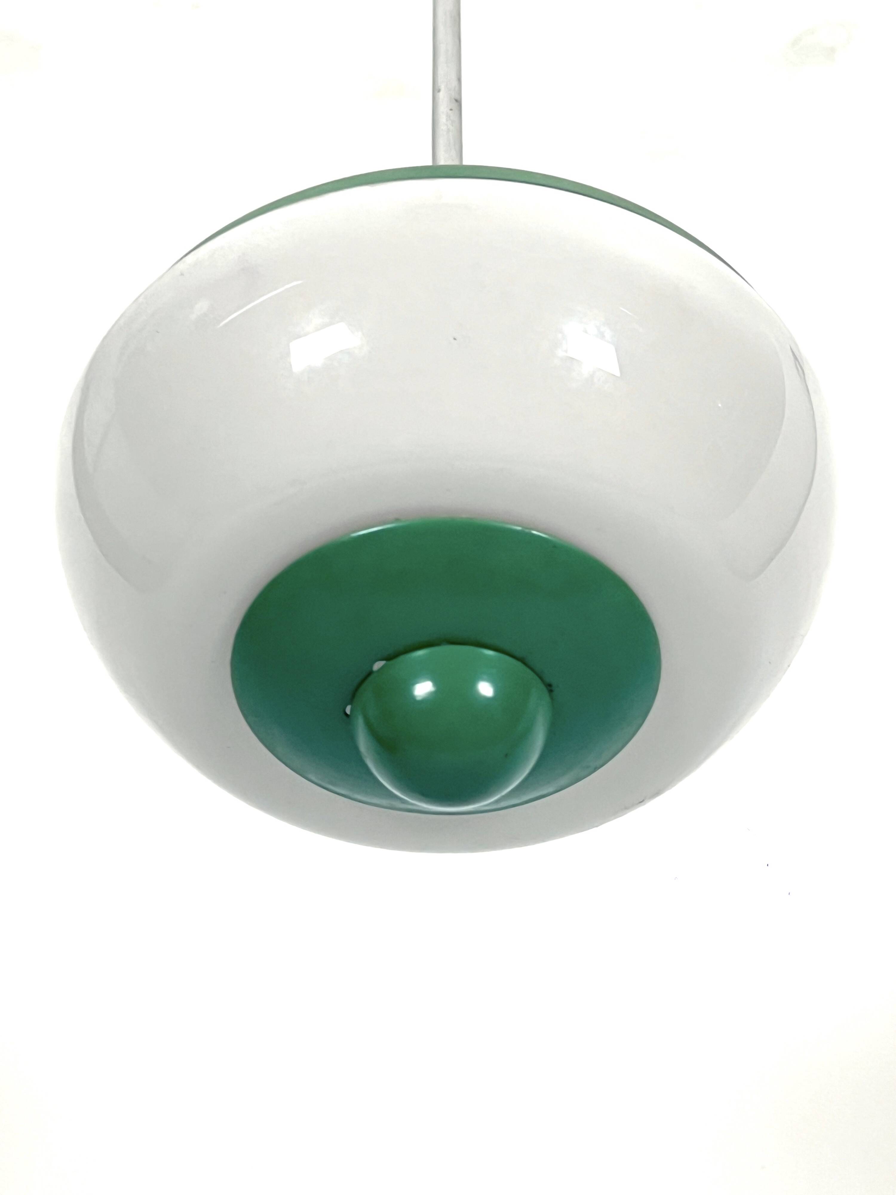 Mid-Century green lacquer and milk glass pendant. Italy 1950s