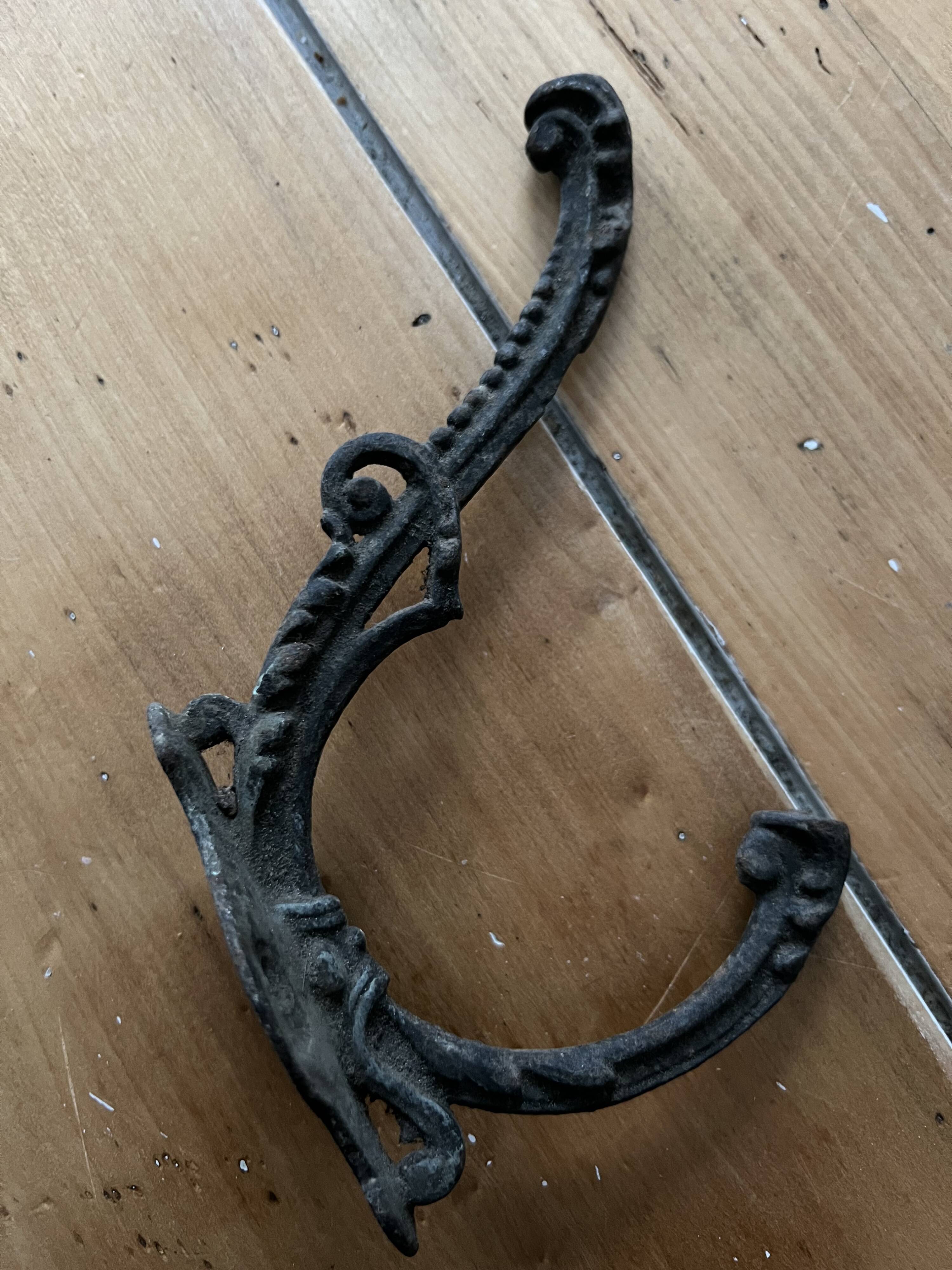 Cast iron coat hook year 1920