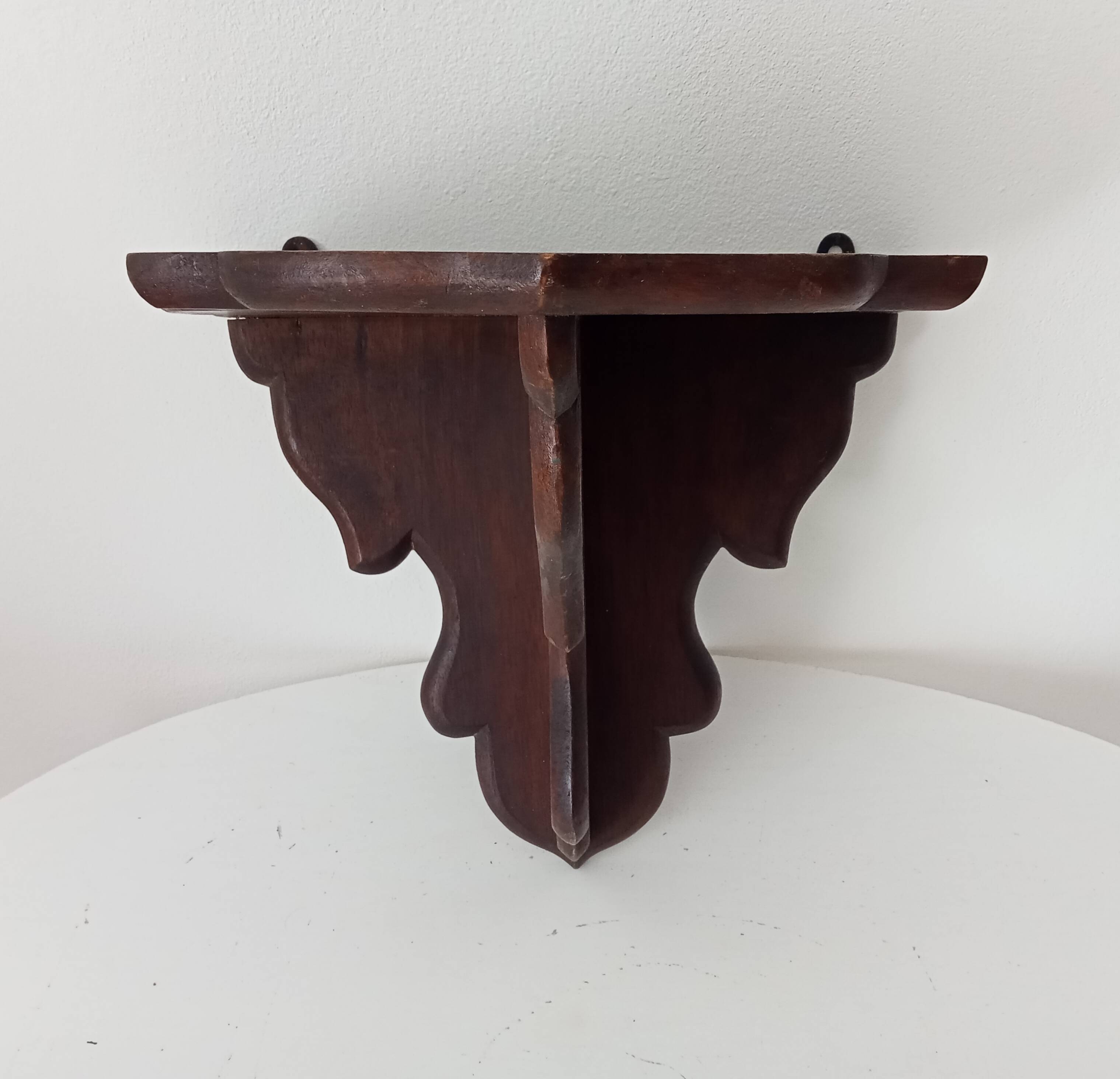 Pair of antique carved wooden shelves