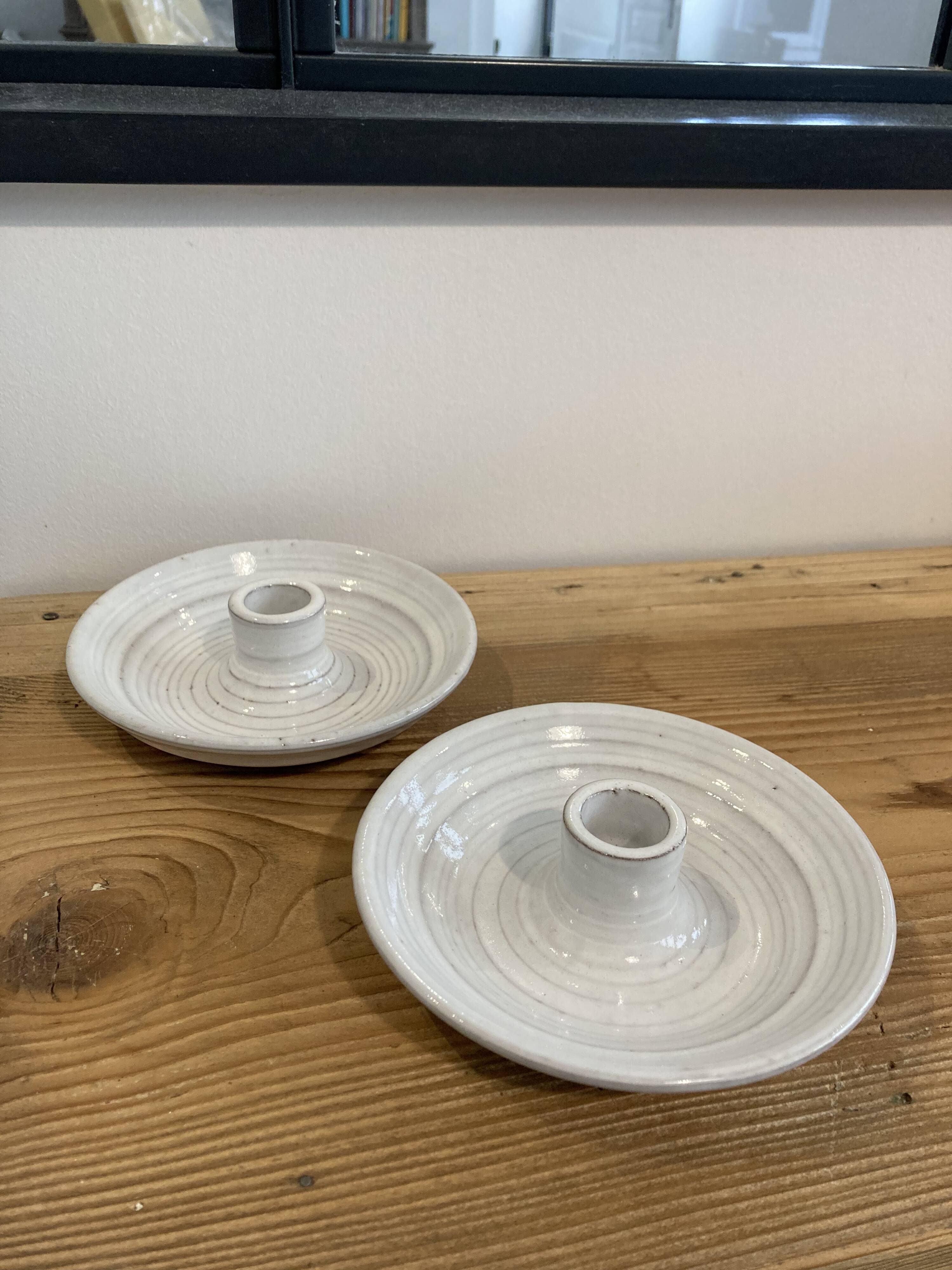 Pair of enamelled ceramic candlesticks