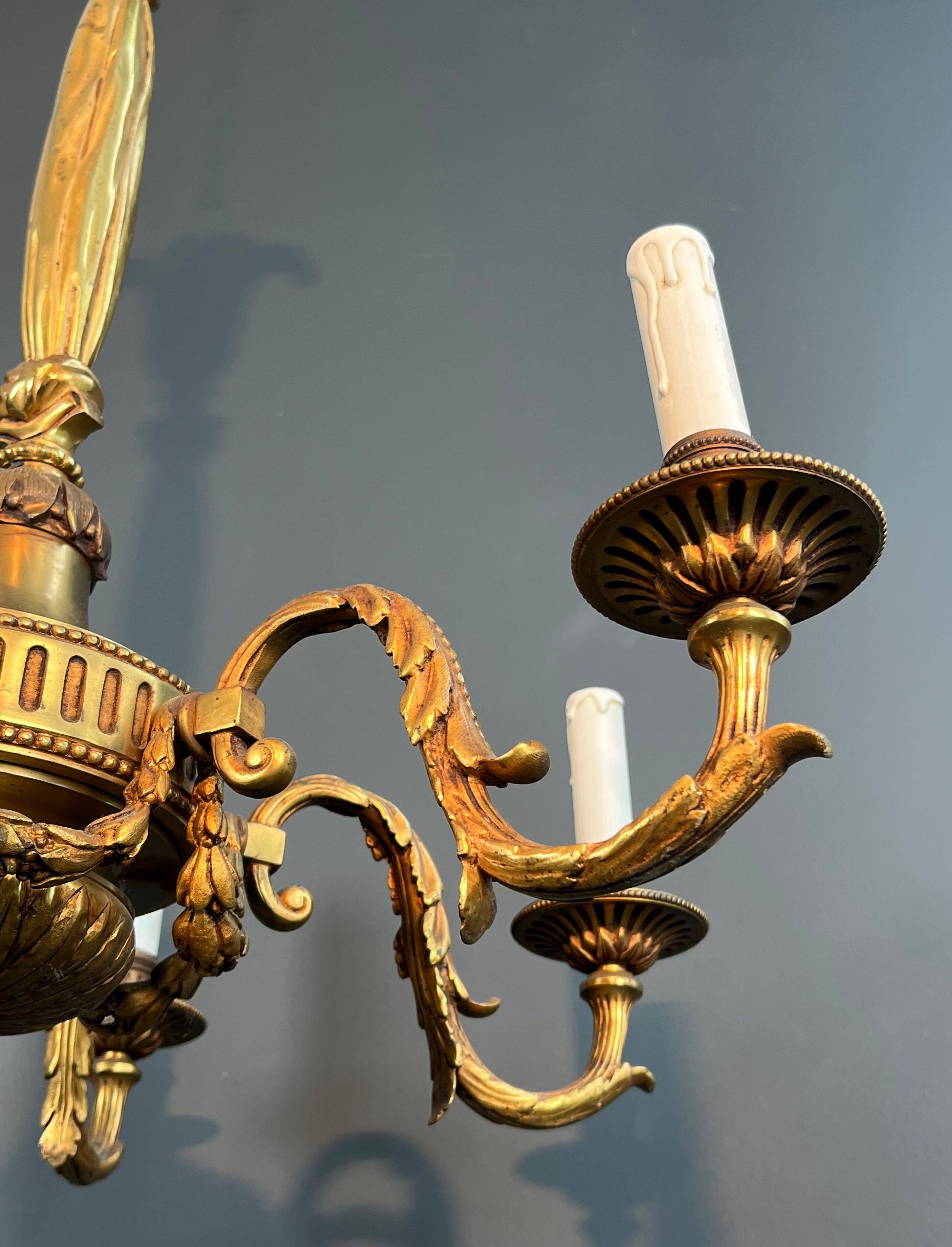 Bronze chandelier in Louis XVI style with 6 arms.