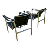 Paire de fauteuils en cuir et acier