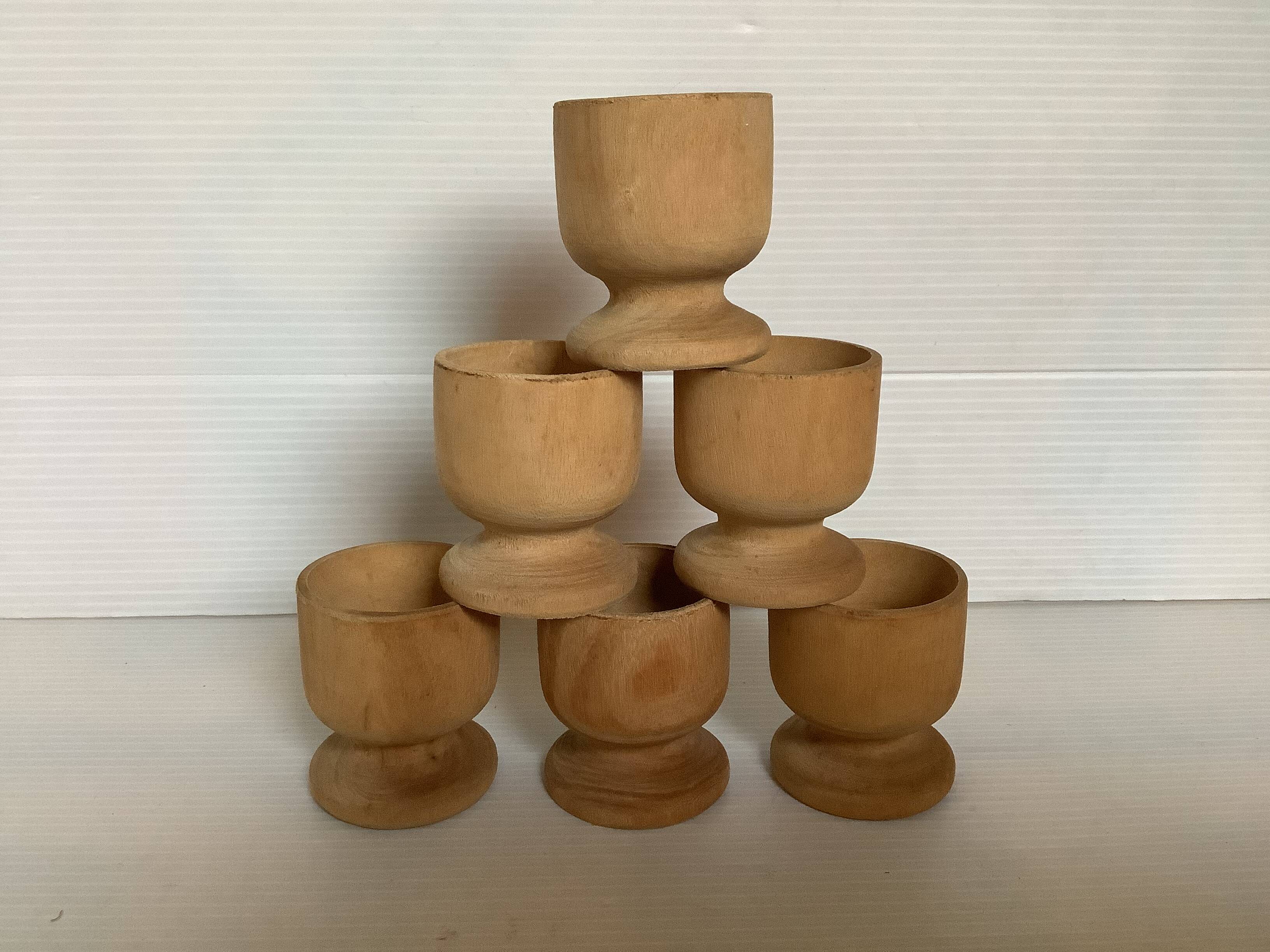 Six wooden egg cups