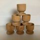 Six wooden egg cups