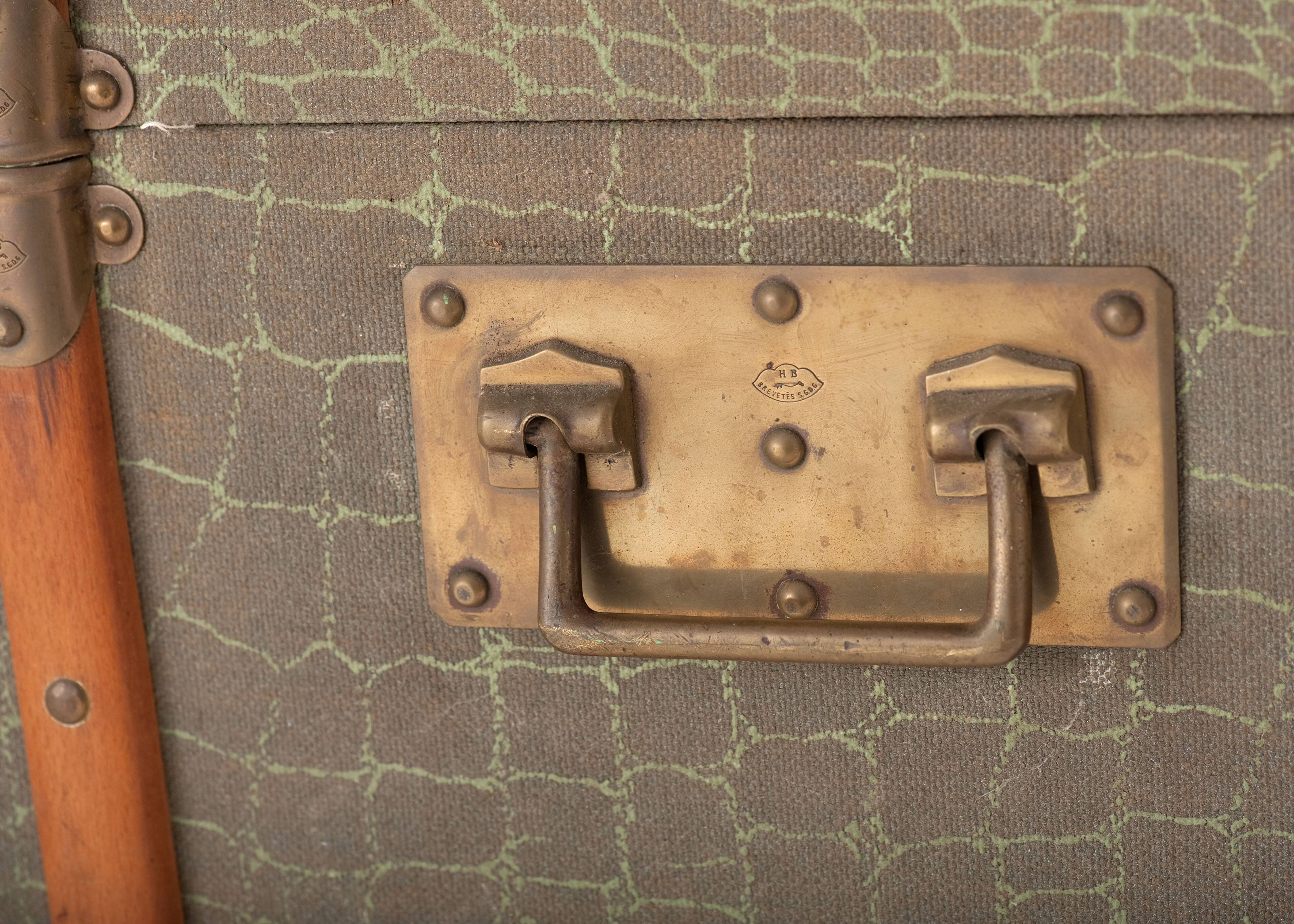 Anc Large cabin trunk in khaki canvas with a snakeskin effect, wood & brass