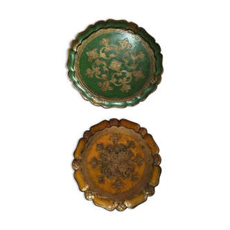 Two Florentine round table tops.