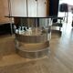 Table basse ovale design années 70 en verre et pieds chromé « S »