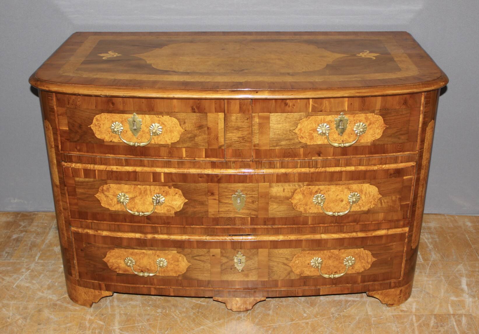 Louis XIV commode in 18th-century marquetry