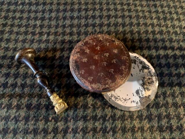 Very old round pocket mirror and leather case, 18th century