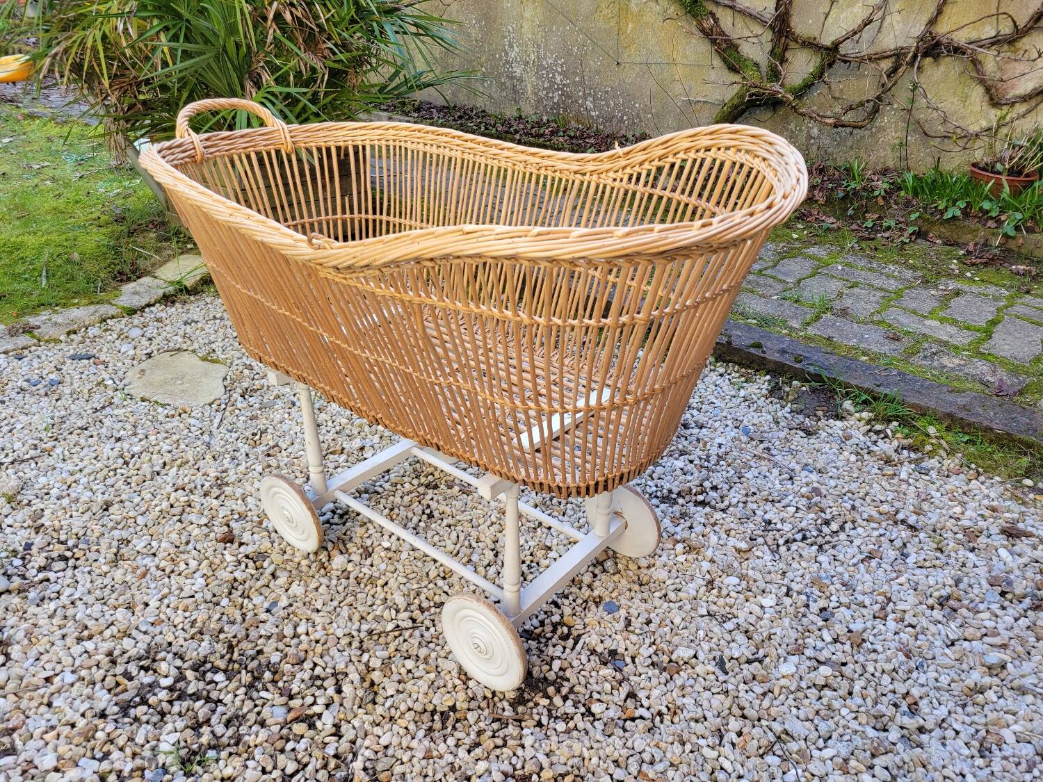 Wicker cradle on wheels, late 19th century