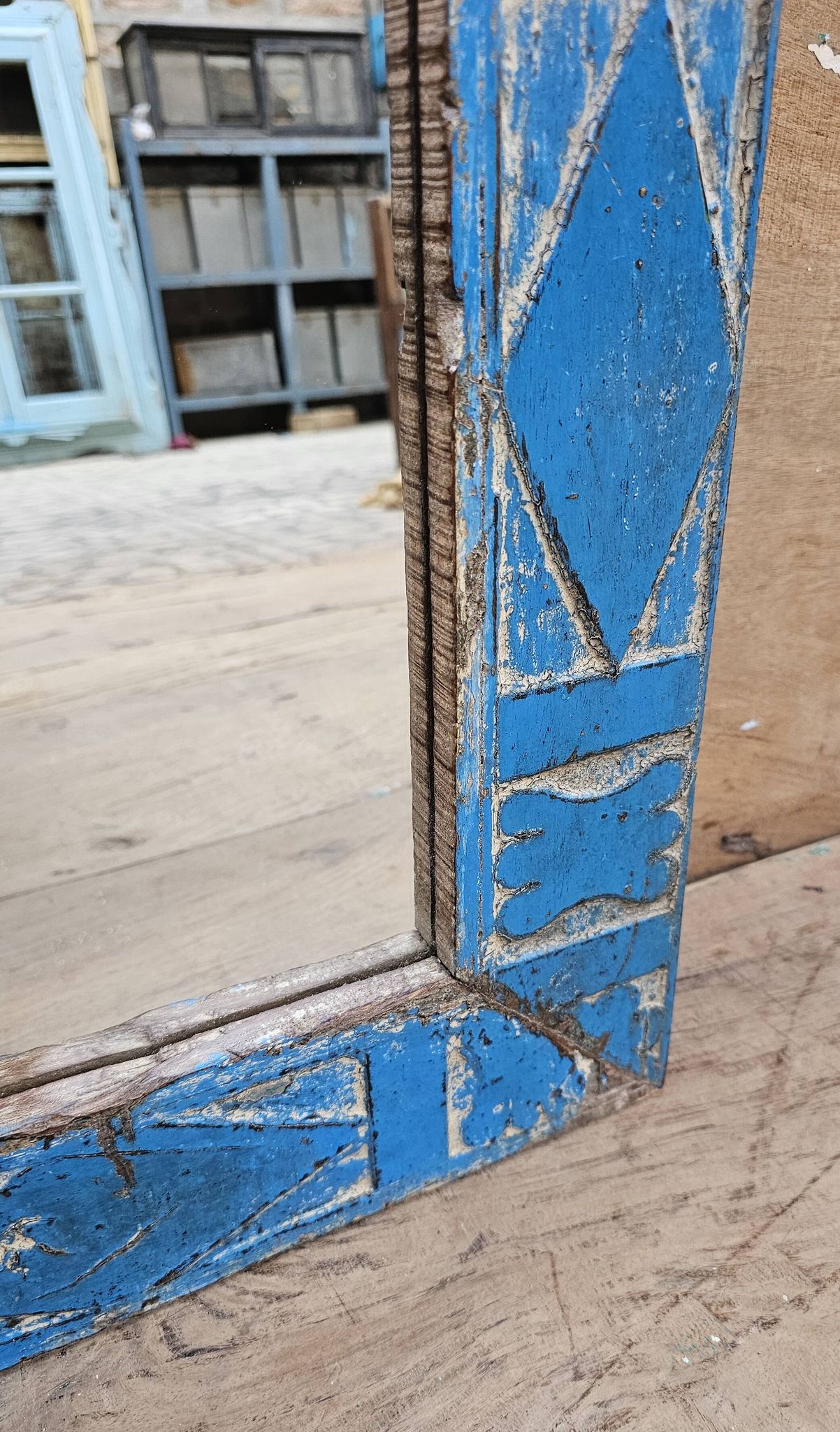 Antique Art Deco mirror in Burmese teak.