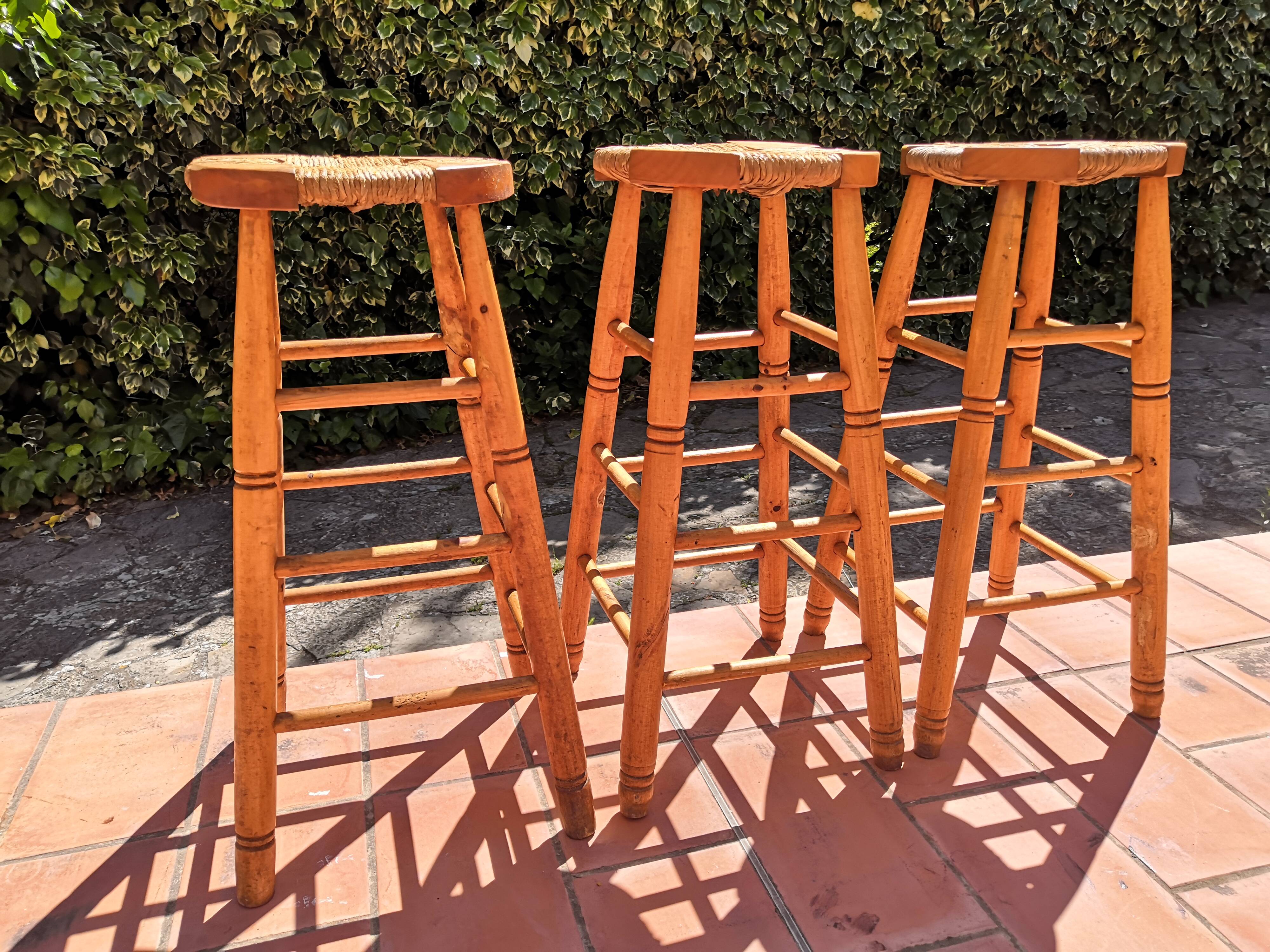 Set of 3 high “modernist” straw stools vintage 1950s