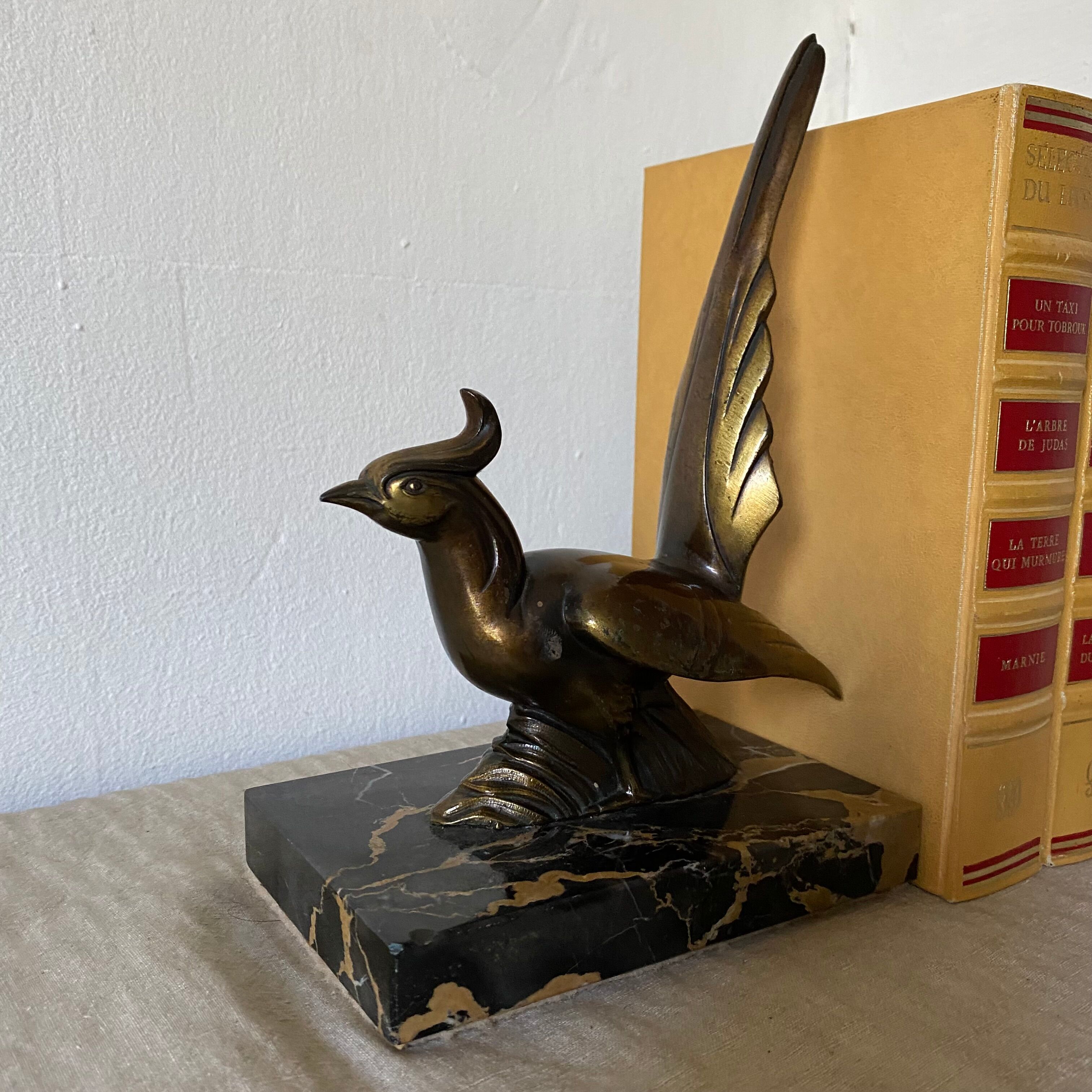 Greenhouse books bird marble