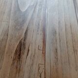 Antique wooden desk with a patinated base