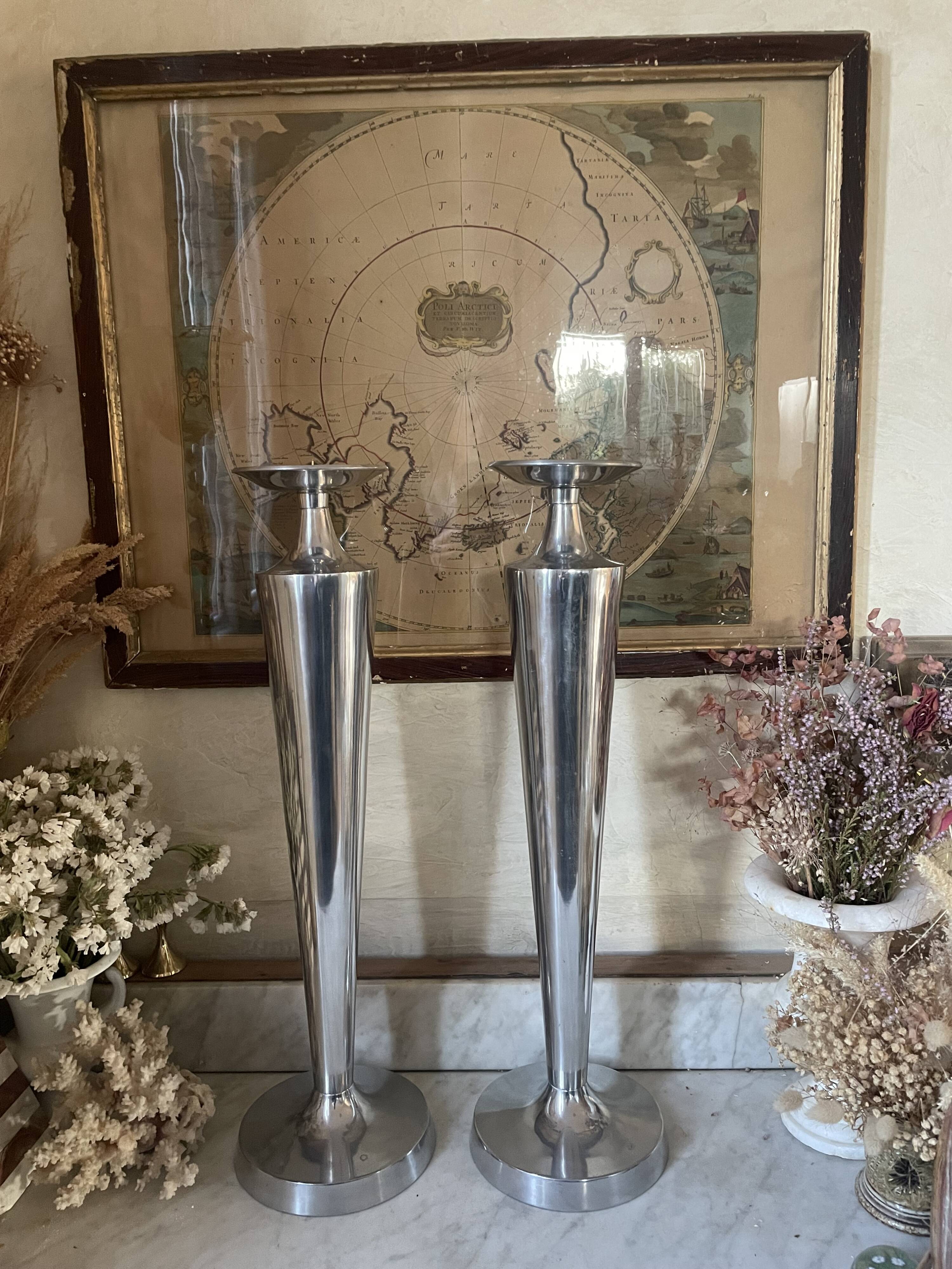 Pair of aluminium cast candle holders 52cm
