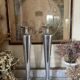 Pair of aluminium cast candle holders 52cm