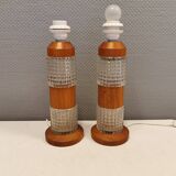Swedish table lamps made of teak wood and hard pressed crystal glass.