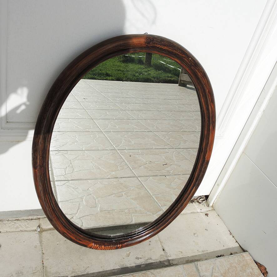 Vintage oval rattan mirror