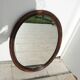 Vintage oval rattan mirror
