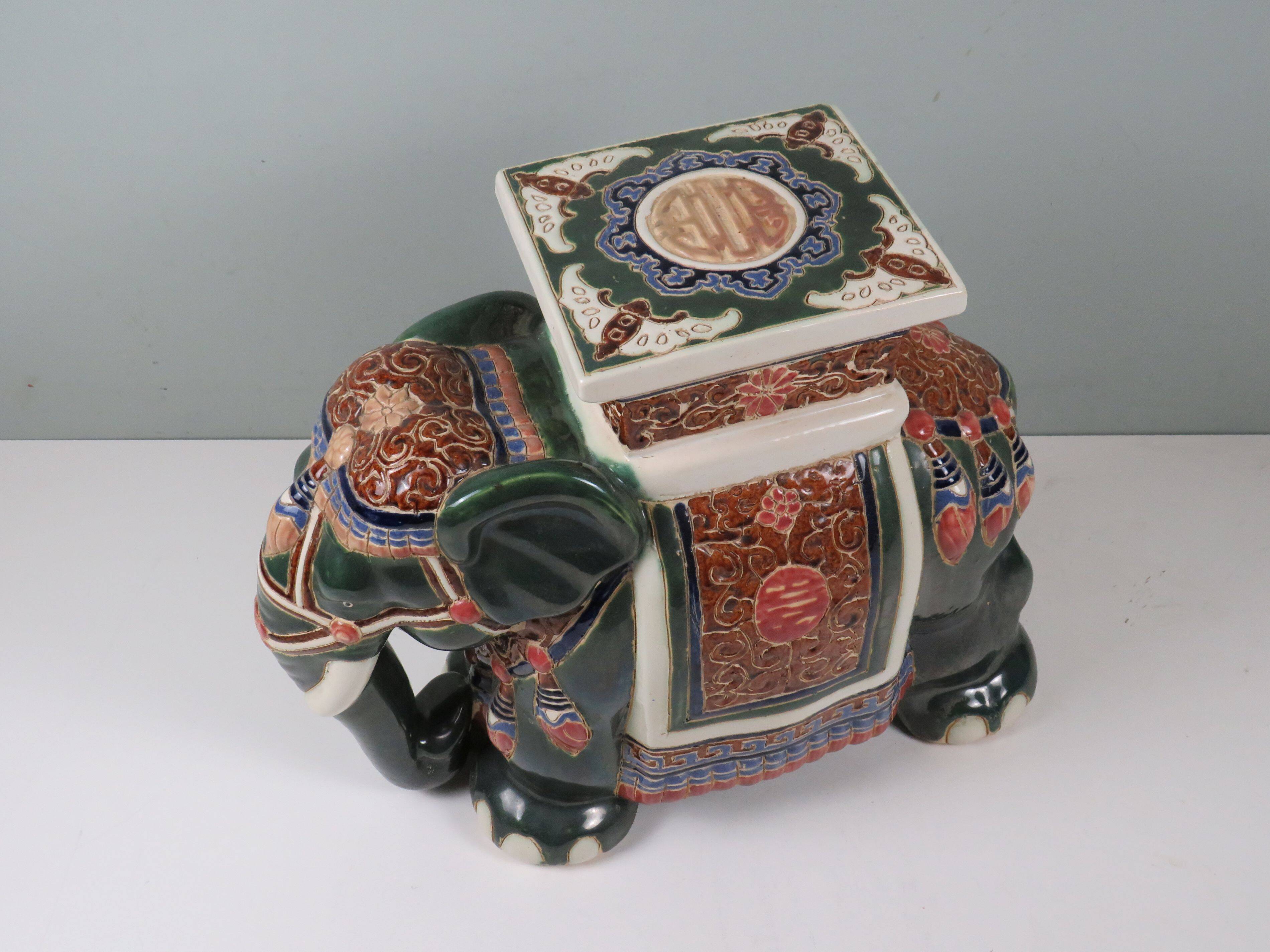 Large vintage ceramic elephant in glazed finish, stool or side table.