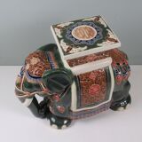 Large vintage ceramic elephant in glazed finish, stool or side table.