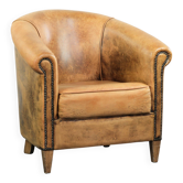 Vintage sheepskin club armchair in a light cognac colour