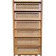 Vintage rattan chest of drawers with splayed legs from the 1950s.