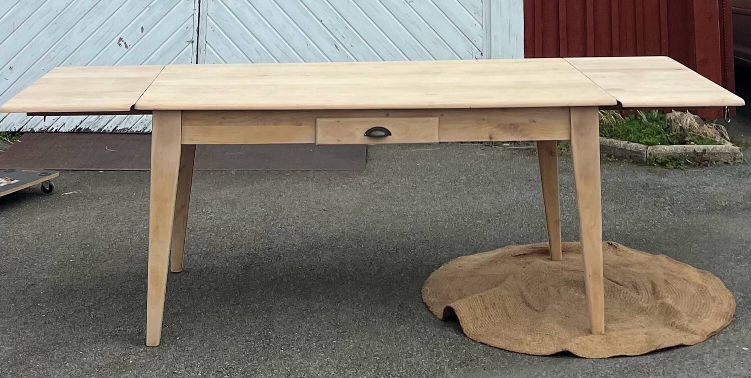 Large renovated table with 2 extensions and 2 drawers in raw solid wood.