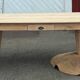 Large renovated table with 2 extensions and 2 drawers in raw solid wood.