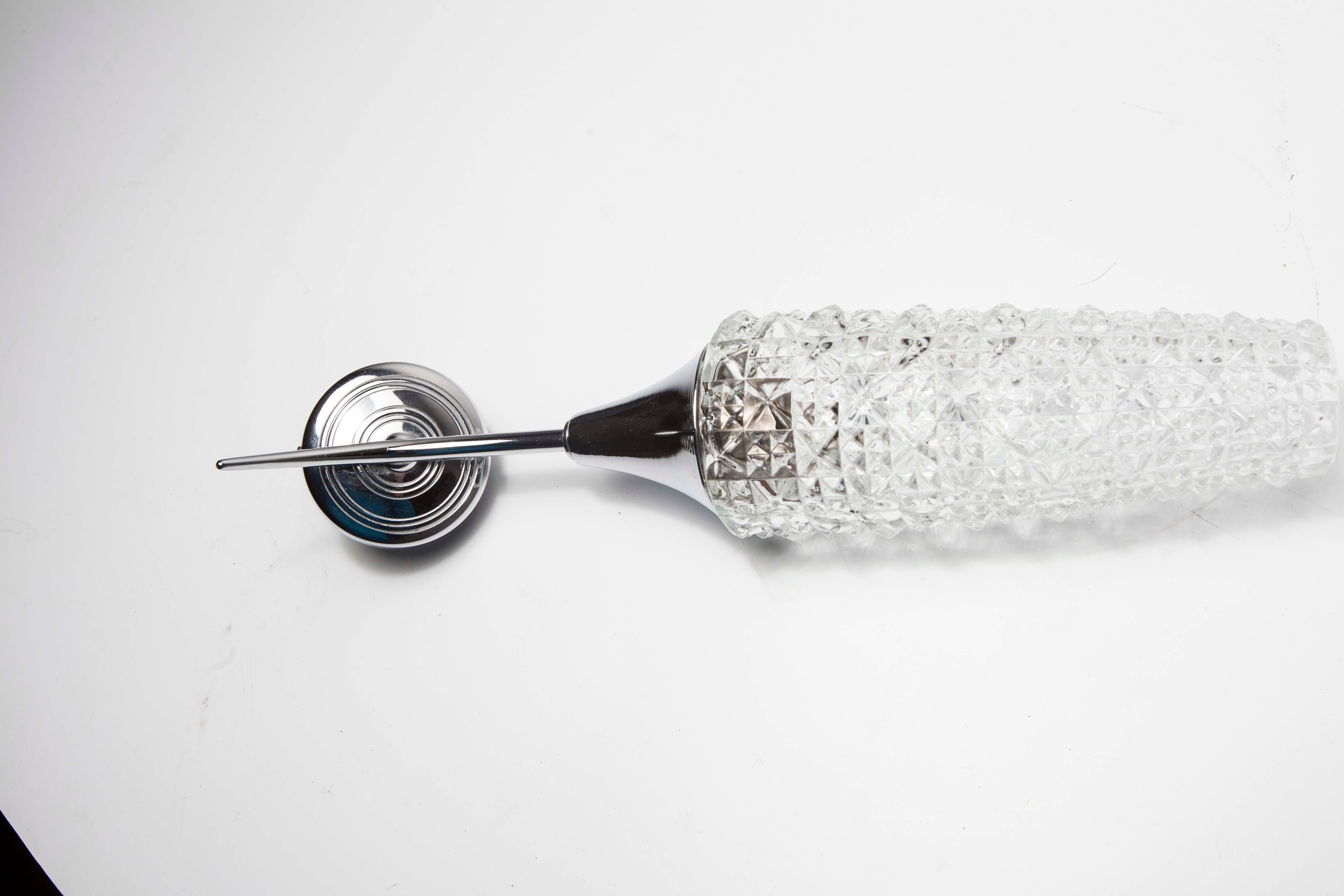 Torch wall lampof the 60s in silver and glass