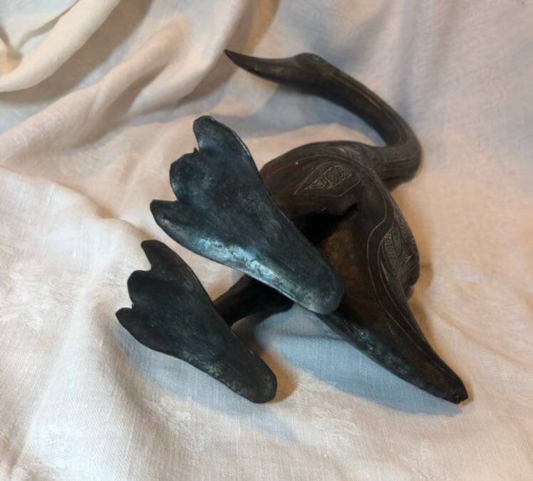 Damascened metal bird sculpture