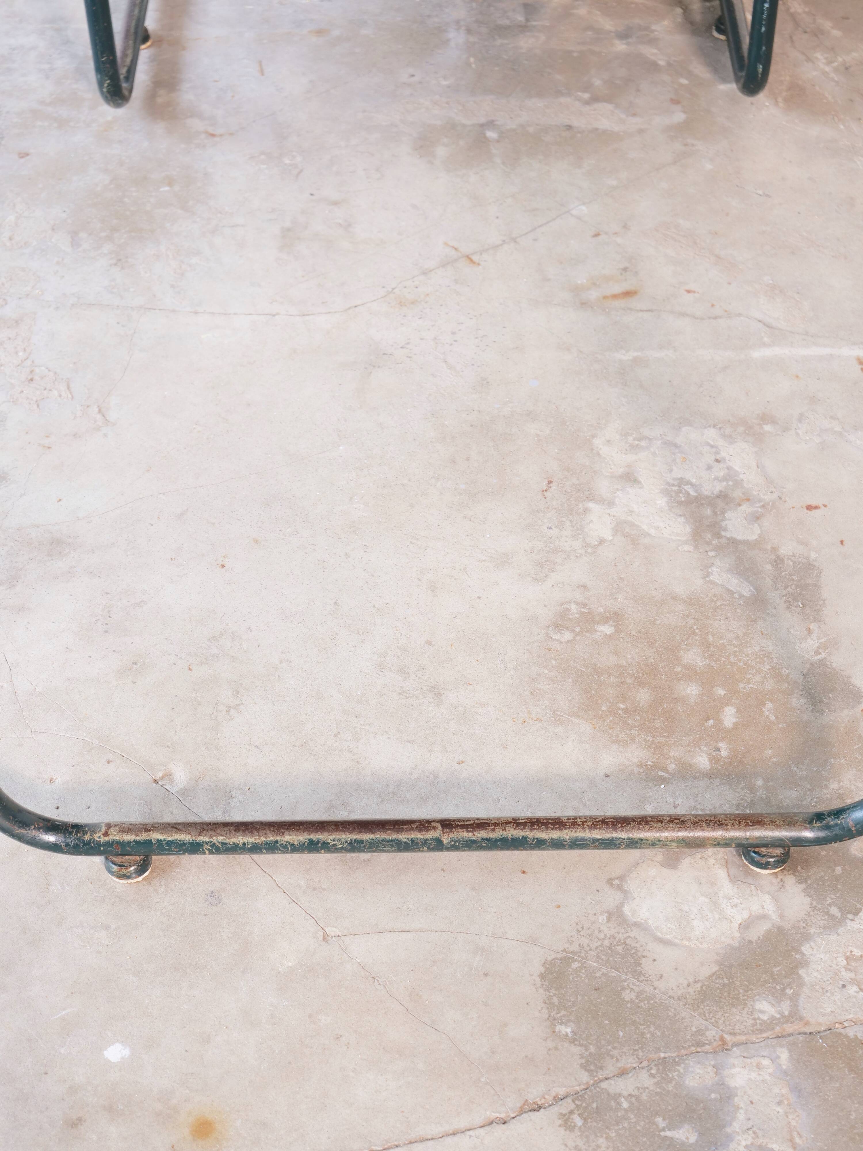Desk with bauhaus style tubular steel chair