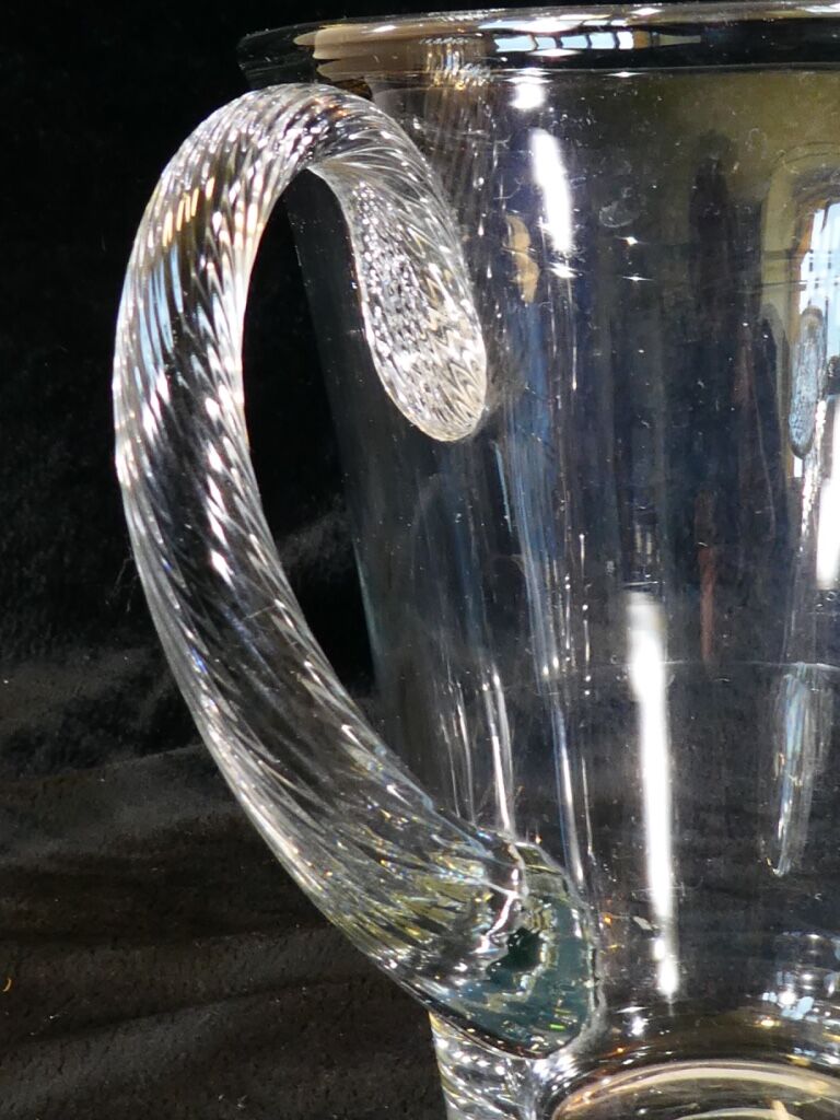 Pitcher Carafe has orangeade em blown glass