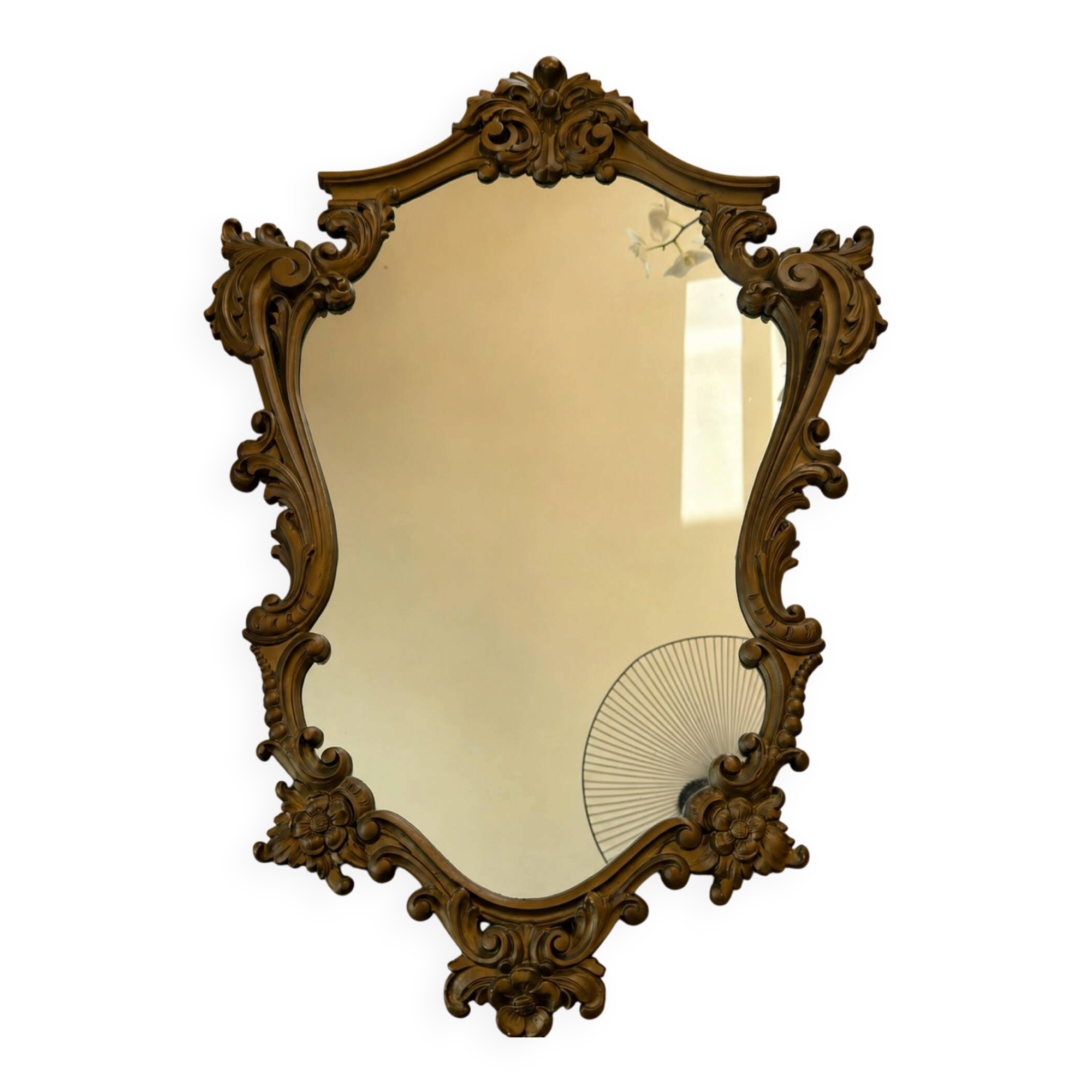Antique mirror in Louis XV Rocaille style with carved frame.