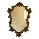 Antique mirror in Louis XV Rocaille style with carved frame.