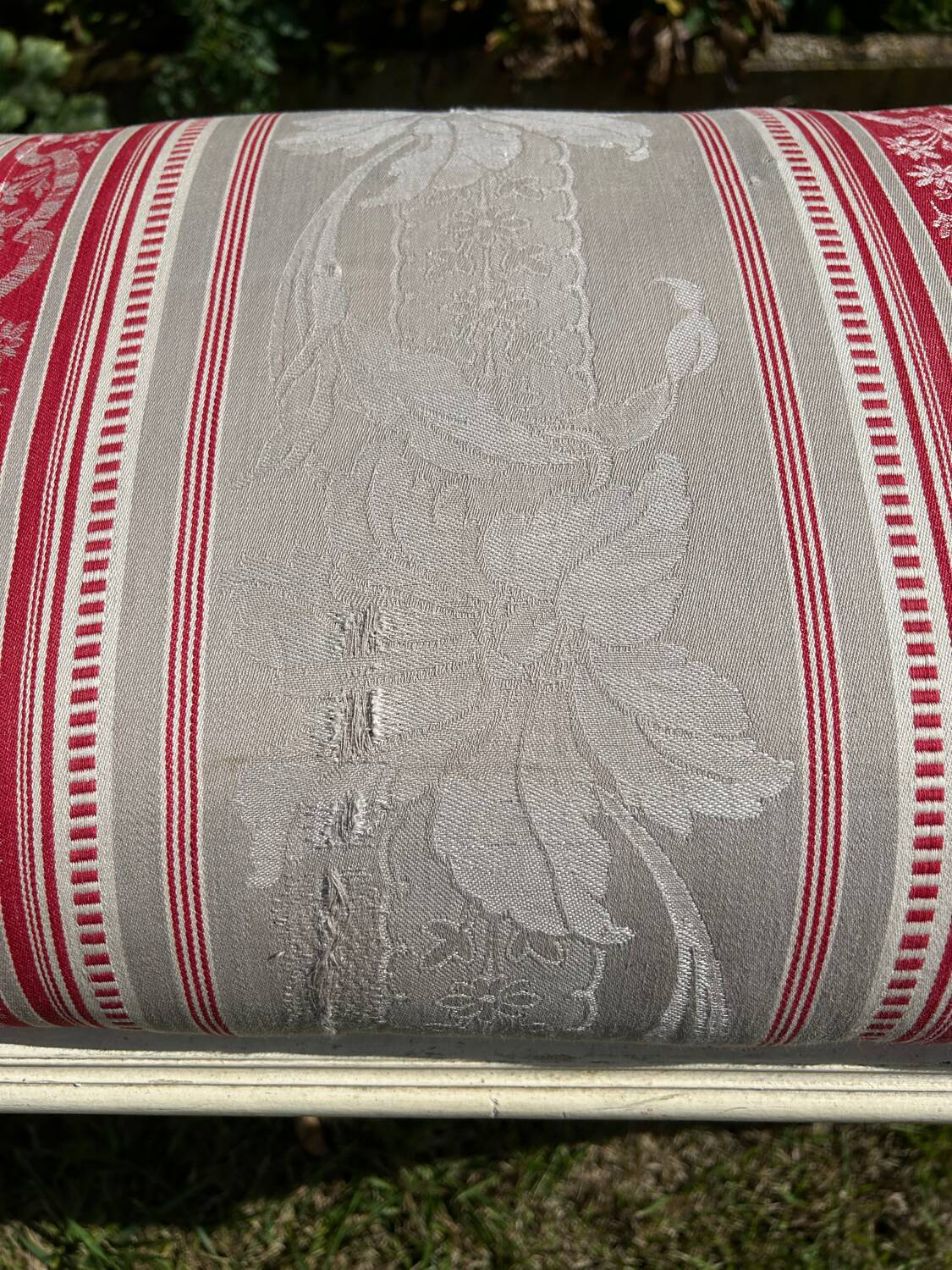 Louis XVI style bench at the end of the bed