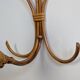 Rattan wall lights by Louis Sognot
